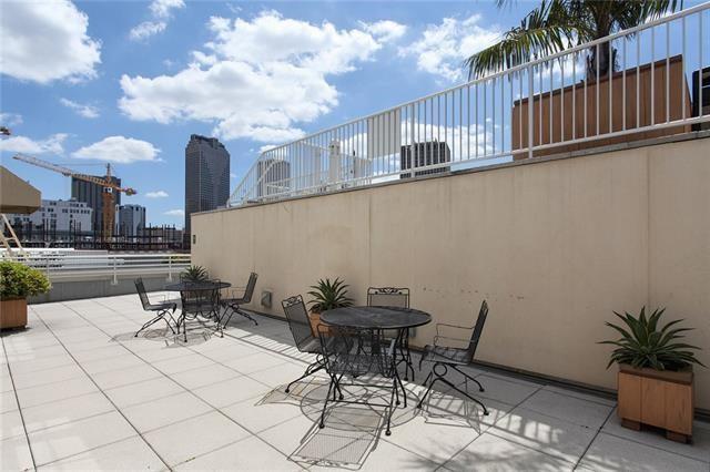 1201 Canal St Unit 271, New Orleans, LA 70112 - view of patio / terrace with outdoor dining space and a view of city