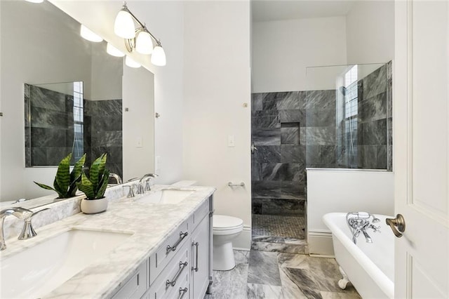 1805 Governor Nicholls St, New Orleans, LA 70116 - bathroom featuring marble finish flooring, a soaking tub, walk in shower, and double vanity