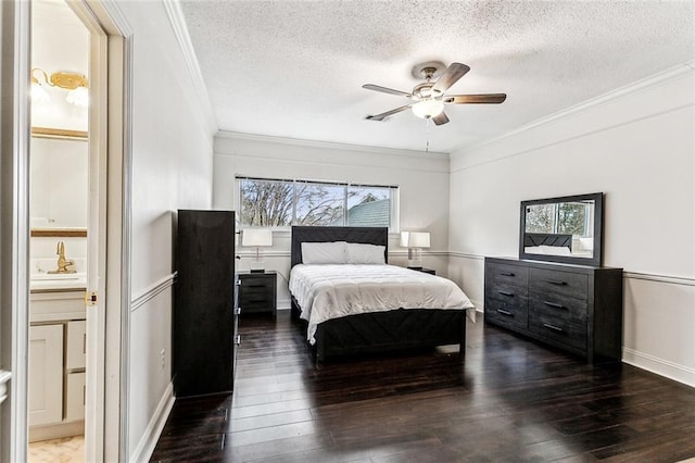 bedroom with ornamental molding, ceiling fan, dark hardwood / wood-style floors, and multiple windows