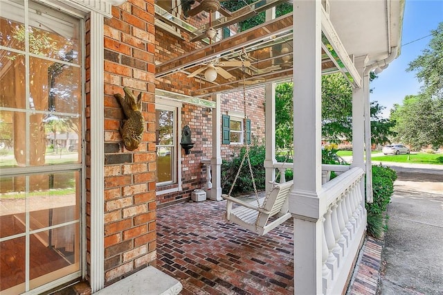 view of patio / terrace featuring a porch and ceiling fan