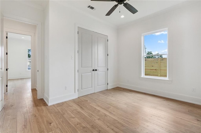 unfurnished bedroom with a closet, ceiling fan, and light hardwood / wood-style flooring
