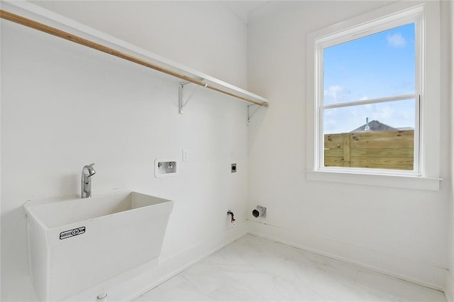 laundry area featuring sink, washer hookup, gas dryer hookup, and electric dryer hookup