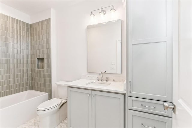 full bathroom with vanity, toilet, and tiled shower / bath