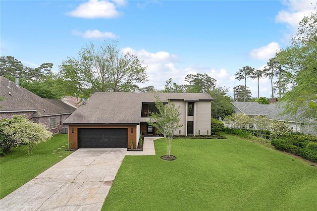 view of front of house featuring a garage and a front yard