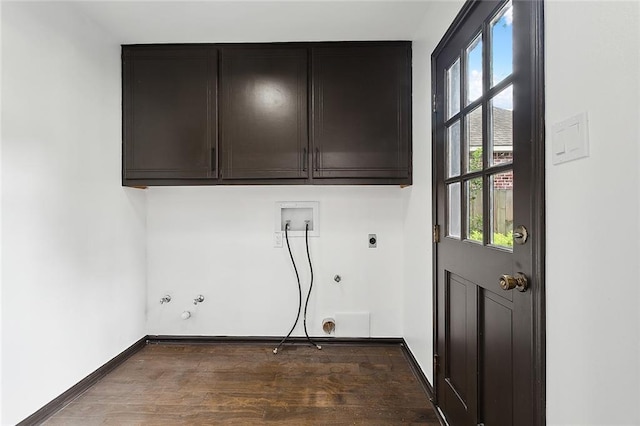 laundry area featuring cabinets, a wealth of natural light, gas dryer hookup, and hookup for an electric dryer