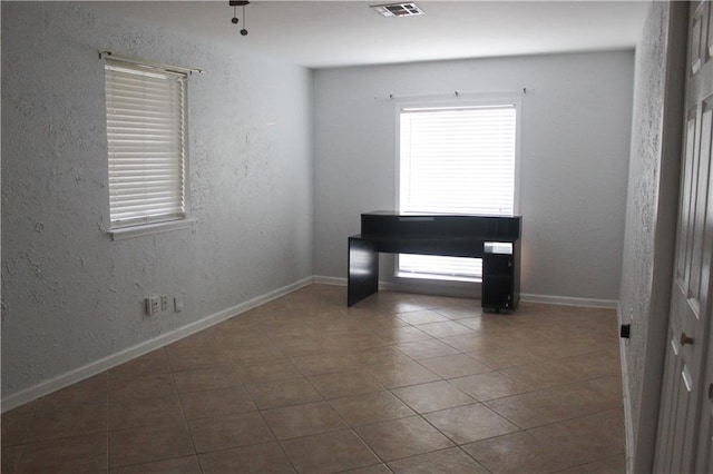 view of tiled empty room