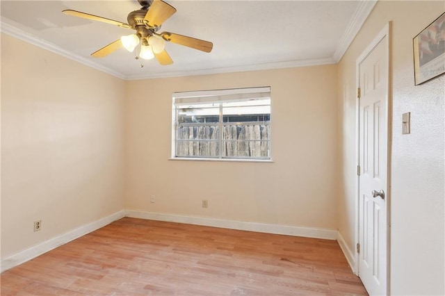 spare room with ceiling fan, crown molding, and light hardwood / wood-style flooring