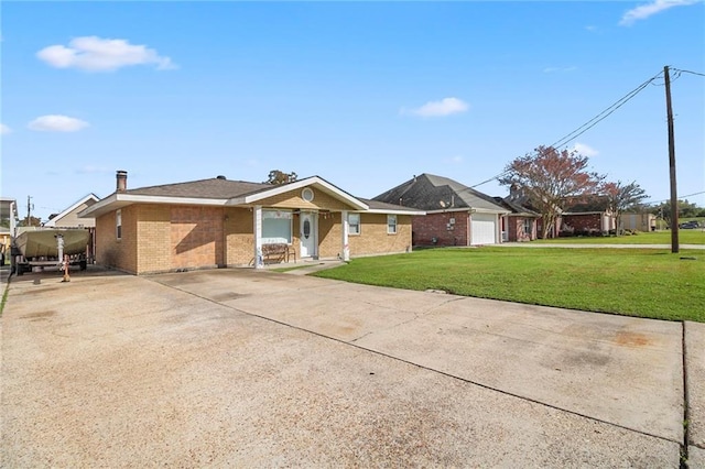 single story home with a front lawn and a garage