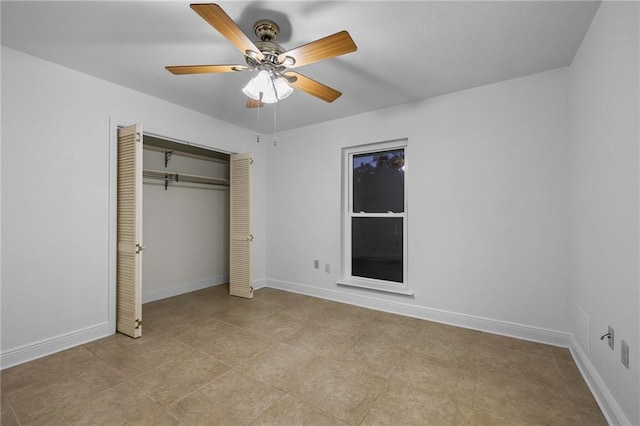 unfurnished bedroom featuring light tile patterned floors, a closet, and ceiling fan