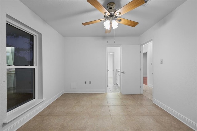 34222 Laurent Rd, Slidell, LA 70460 - spare room featuring a ceiling fan and light tile patterned flooring