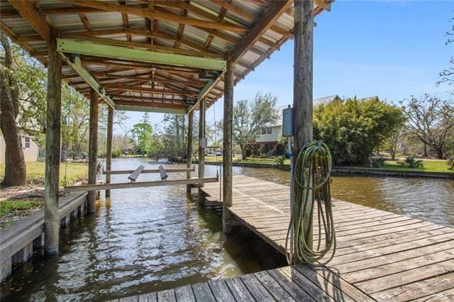 view of dock featuring a water view