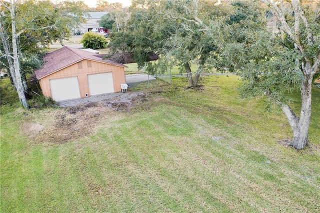 34222 Laurent Rd, Slidell, LA 70460 - view of yard with an outbuilding and a garage