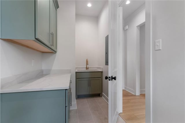 bathroom with hardwood / wood-style floors and vanity