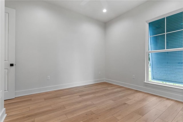 unfurnished room featuring light wood-type flooring