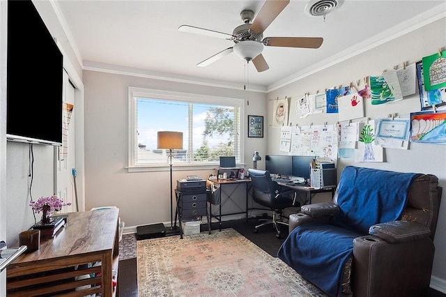 office featuring ceiling fan and ornamental molding