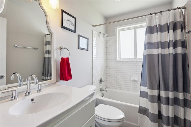 full bathroom featuring vanity, toilet, and shower / bath combo with shower curtain