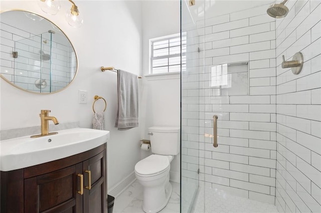 full bath featuring marble finish floor, toilet, vanity, and a stall shower