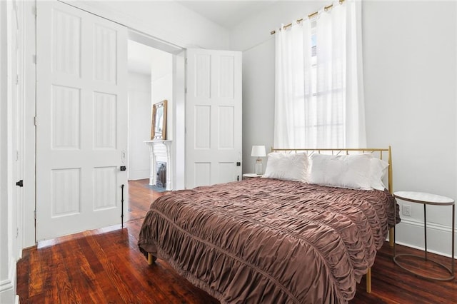 bedroom featuring wood finished floors