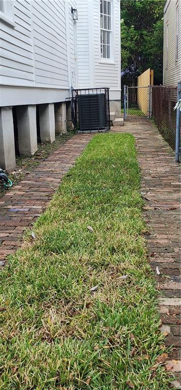 view of yard featuring cooling unit