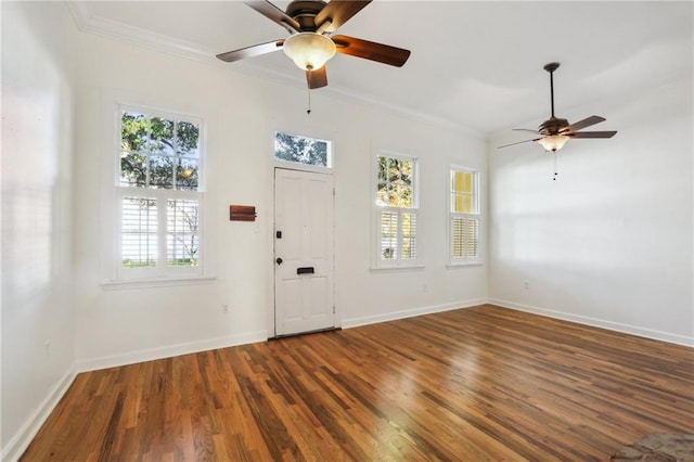 entrance foyer featuring hardwood / wood-style floors and ornamental molding