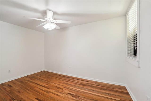 unfurnished room featuring hardwood / wood-style floors and ceiling fan