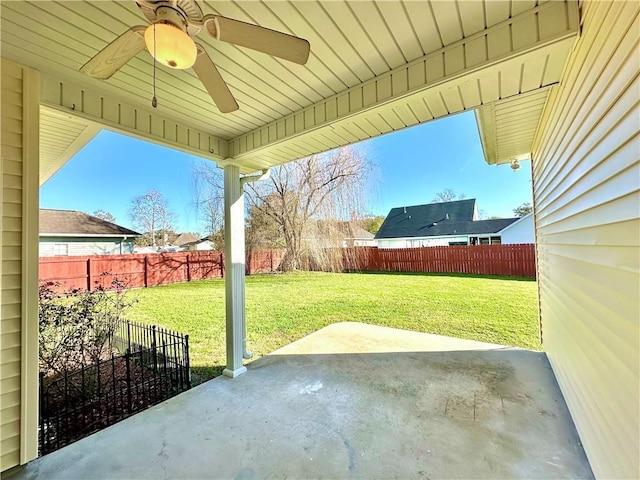 view of patio with a ceiling fan and a fenced backyard