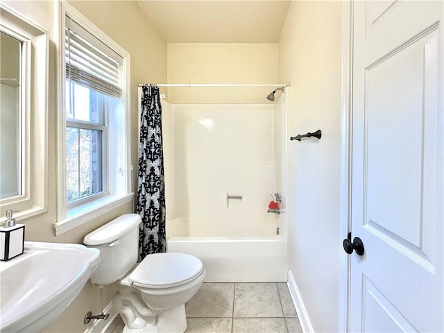 full bathroom with tile patterned floors, toilet, baseboards, and shower / bathtub combination with curtain