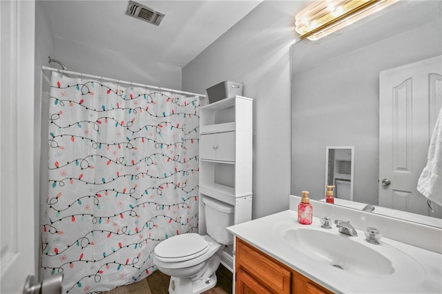 full bathroom featuring shower / bath combo, vanity, toilet, and hardwood / wood-style floors