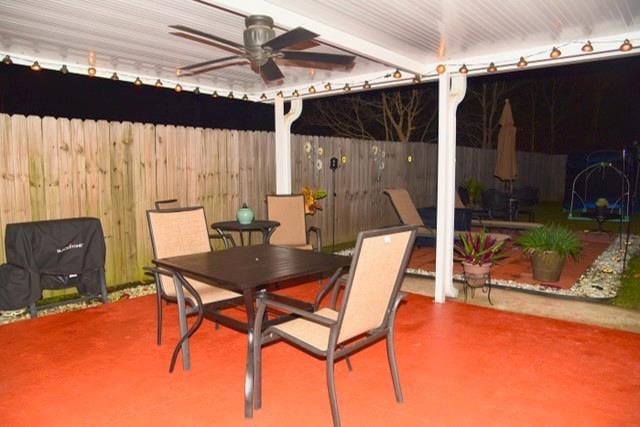 view of patio featuring ceiling fan