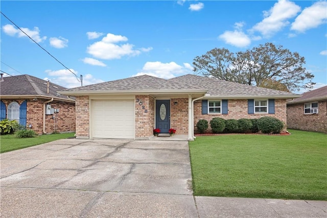 ranch-style house featuring a front lawn and a garage