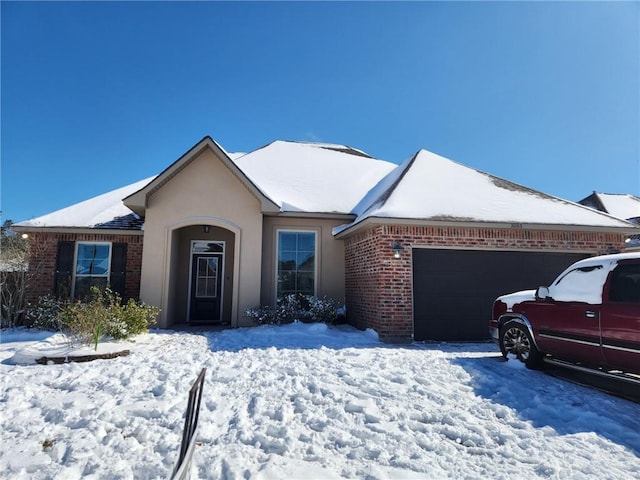 single story home with a garage