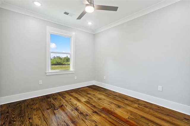 unfurnished room featuring hardwood / wood-style floors, ceiling fan, and crown molding