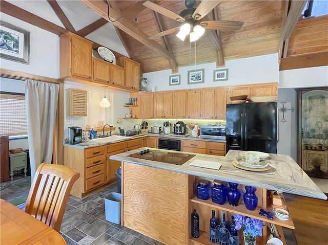 kitchen with beamed ceiling, sink, ceiling fan, wooden ceiling, and black refrigerator with ice dispenser