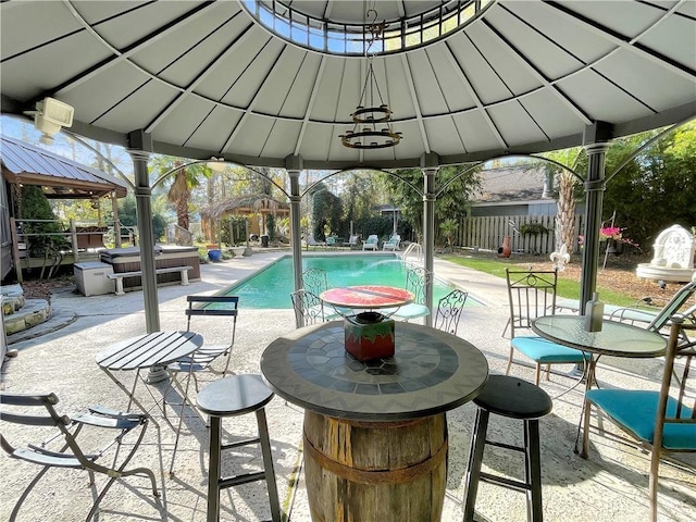 view of pool with a gazebo and a patio area