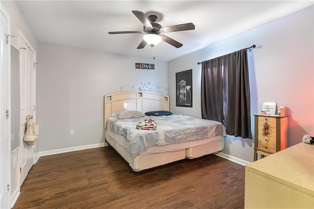 bedroom featuring ceiling fan and dark wood-type flooring