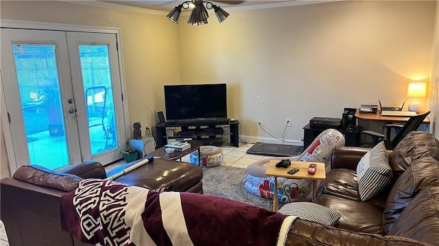 living room with french doors, light tile patterned floors, and crown molding