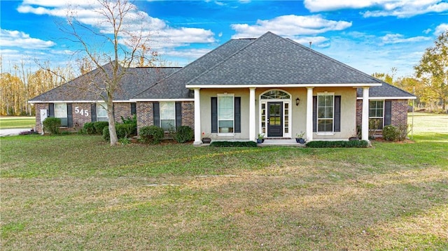 view of front of home featuring a front lawn