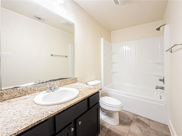 full bathroom featuring tile patterned floors, vanity, bathtub / shower combination, and toilet