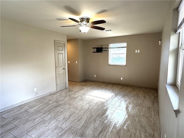 spare room featuring ceiling fan