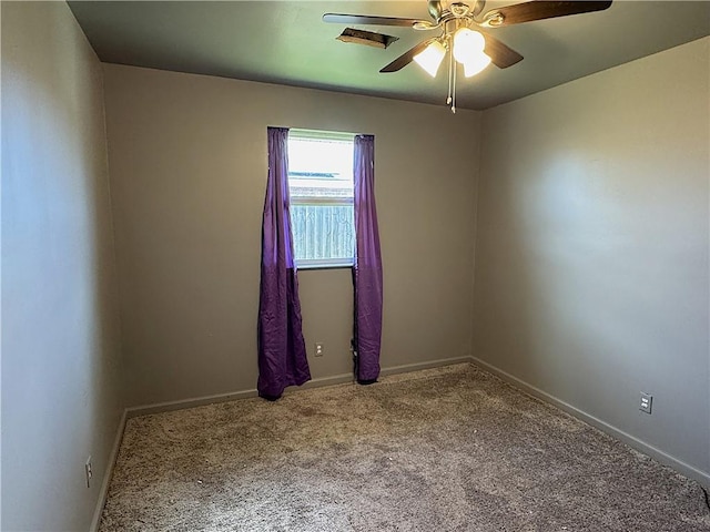 carpeted empty room with ceiling fan