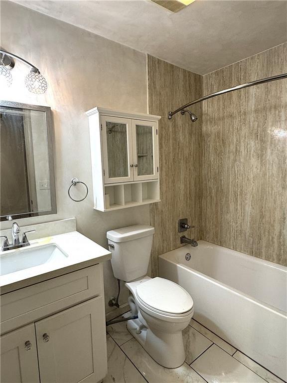 full bathroom featuring vanity, toilet, and shower / tub combination