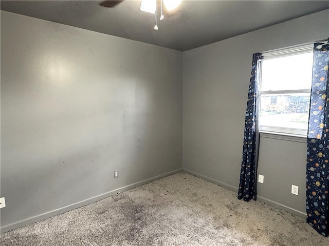 empty room with carpet flooring