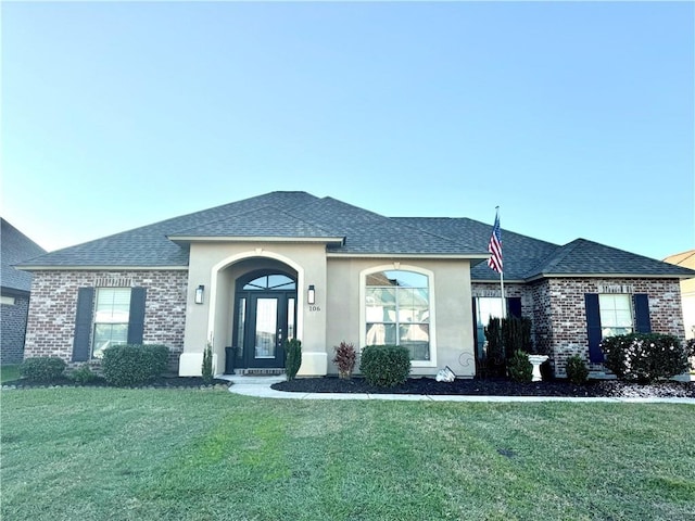 view of front of home with a front yard