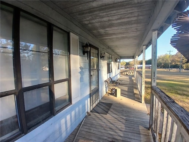 wooden terrace featuring a porch