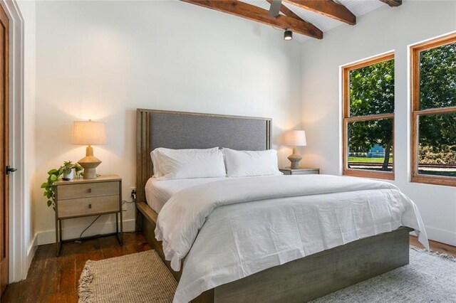 301 S Toulme St Unit 108, Bay Saint Louis, MS 39520 - bedroom featuring a high ceiling, ceiling fan, beam ceiling, dark hardwood / wood-style flooring, and a closet