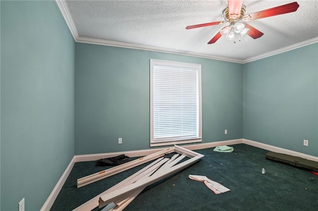 unfurnished room with ceiling fan, a textured ceiling, and ornamental molding