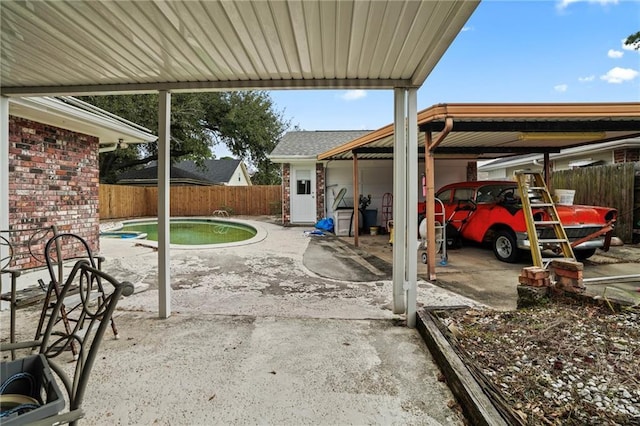 view of patio featuring a fenced in pool