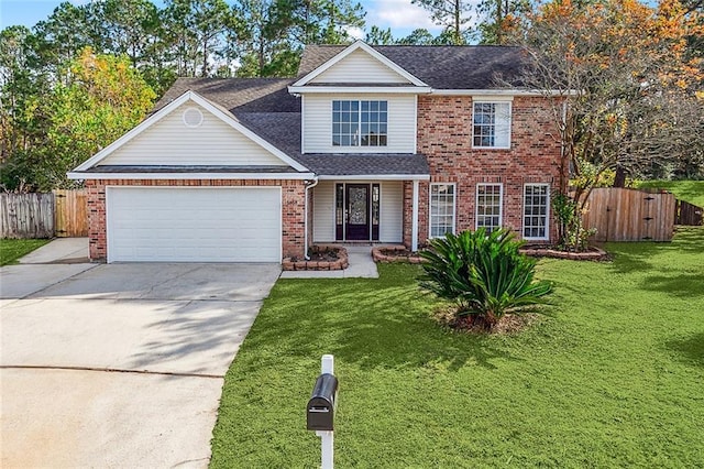 front of property featuring a garage and a front lawn