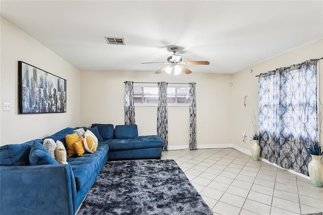 living room with light tile patterned floors and ceiling fan