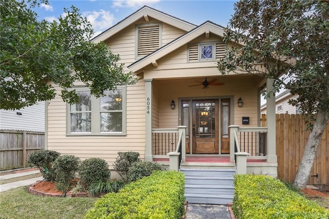 view of front facade with ceiling fan and a porch